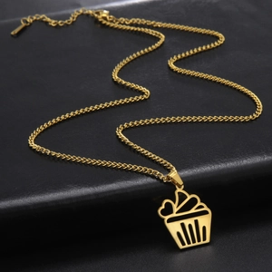 Cute golden cupcake heart pendant necklace in polished stainless steel on black leather
