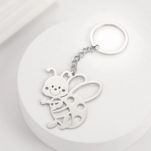 Polished stainless steel keychain featuring a cute hollow-out honey bee pendant design