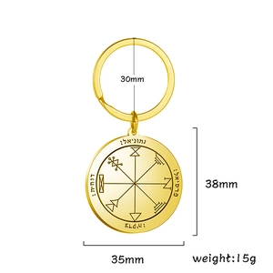 Detail of 18k gold plated Solomon amulet pendant with laser engraved Hebrew symbols
