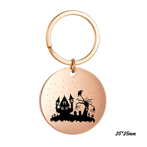 Portachiavi in oro rosa con silhouette di casa stregata e corvo, acciaio, 25x25mm