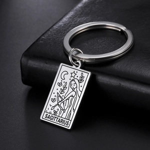 Detailed view of laser-engraved Sagittarius stainless steel square charm keychain