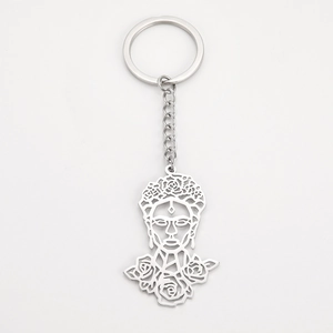 Detailed view of Frida Kahlo cutout portrait on stainless steel silver keychain