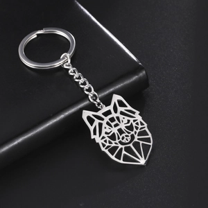 Detailed view of silver stainless steel keychain with a geometric hollow wolf head charm