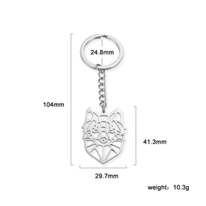 Stainless steel keychain featuring a geometric hollow wolf head pendant in silver finish