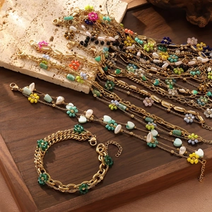 Bohemian multilayer gold plated necklace with colorful resin flowers and heart charms