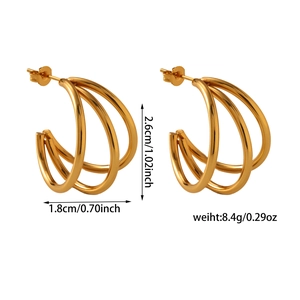 Detail showing dimensions and weight of triple-layered C-shaped golden metal hoop earrings