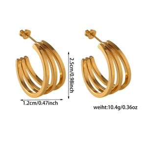 Detail view of triple-layered golden C-shaped hoop earrings with size and weight specs