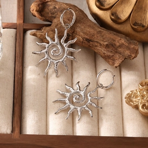 Creative titanium steel sun pendant earrings with 18k gold plating and spiral artistic texture