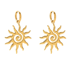Detail of 18k gold sun pendant earrings with hammered texture and sunburst design