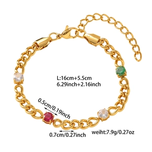Detail view of gold Cuban chain bracelet with colorful round stones and lobster clasp
