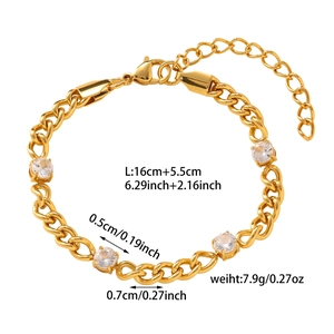 Detail of gold titanium steel bracelet with cubic zirconia stones and adjustable chain