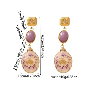 Detail view of purple dried flower resin drop earrings with precise dimensions shown