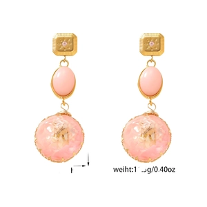 Pink dried flower drop earrings with gold metal top and transparent resin ball pendant