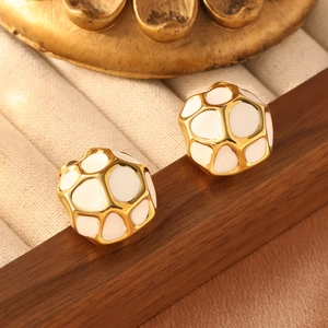 Golden mesh ball stud earrings with white enamel inlay and vintage design texture