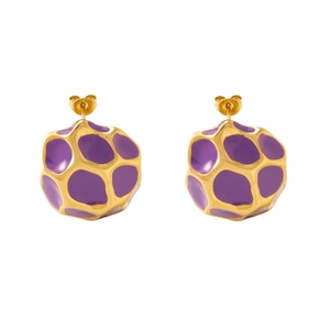 Macro detail of geometric gold stainless steel earrings with purple enamel coating