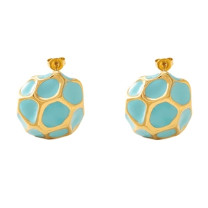 Detail of light blue enamel stud earrings with gold geometric honeycomb pattern on metal