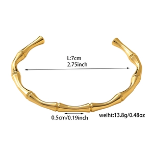 Detail view of 18K gold plated bamboo bangle with dimensions 7cm diameter and 13.8g weight
