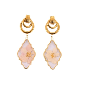 Elegant gold earrings with diamond-shaped resin pendants containing real pink dried flowers