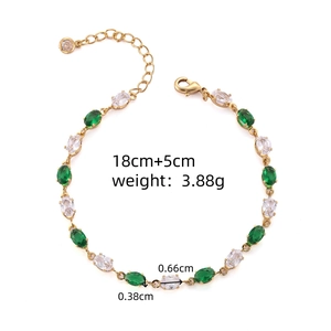 Détail du bracelet doré avec pierres de zircon vert et blanc et dimensions indiquées