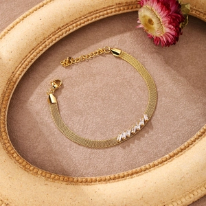 Detailed view of the rose gold mesh chain necklace with elegant zircon stone inlay