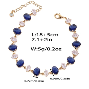 Détail du bracelet doré avec zircons bleus affichant la taille 18+5cm et le poids 5g