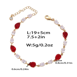 Détail du bracelet doré avec zircons poires rouges et blancs et dimensions indiquées