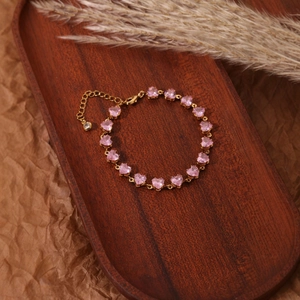 Bracelet cœurs roses en cristal doré avec chaîne ajustable et fermoir mousqueton