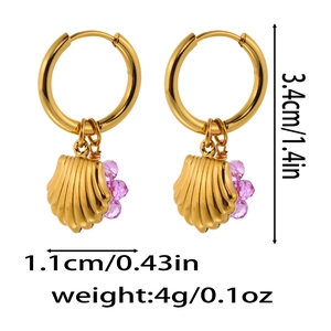 Detail view of gold hoop earrings with shell pendant and purple bead with dimensions