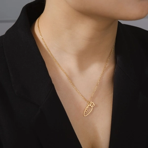 Minimalist stainless steel necklace featuring a hollow carrot pendant on a female model