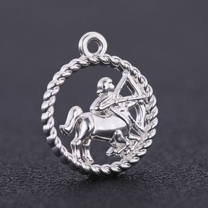 Close-up of Sagittarius zodiac charm with antique silver finish and twisted rope border