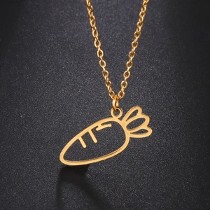 Close-up of a minimalist hollow carrot pendant necklace in polished gold stainless steel