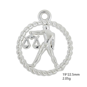 Macro shot of silver Libra zodiac pendant with 19x22.5mm dimensions and 2.05g weight