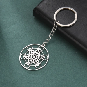 Detail of silver stainless steel keychain featuring Metatron's Cube sacred geometry pendant