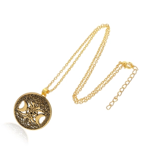 Vintage gold moon pentagram necklace with celtic knots on a white background