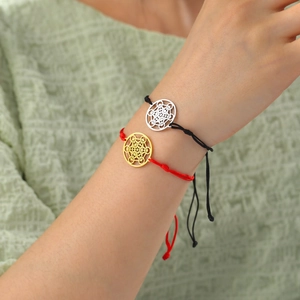 Bracelet tressé Sceau de l'Archange avec breloques géométrie sacrée or et argent