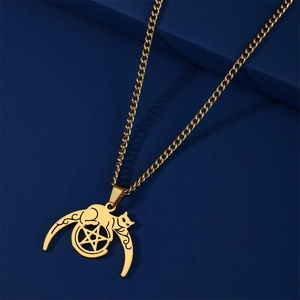 Golden moon cat pentagram pendant necklace made of stainless steel on blue background
