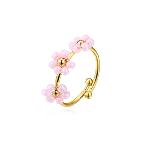 Adjustable gold stainless steel ring with three small pink daisy flower beads for women