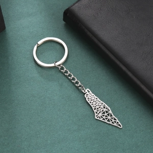 Detailed close-up of 304 stainless steel keychain with geometric map hollow pendant