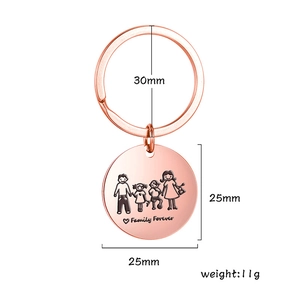 Rose gold stainless steel keychain detail showing Family Forever engraving and 25mm diameter