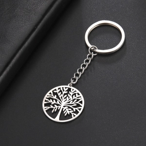 Detailed view of silver tree of life cutout pendant on high quality stainless steel keychain