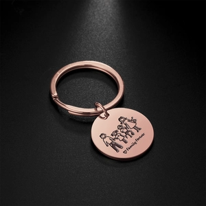 Detail of rose gold keychain with family engraving and Family Forever text