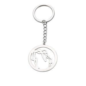 Silver stainless steel keychain with hollow circular gymnast silhouette pendant design