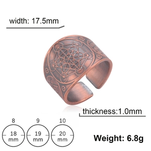 Macro detail of retro bronze ring showing 17.5mm width and sacred geometry engravings