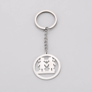 Silver stainless steel keychain with cutout pendant showing two girls holding hands