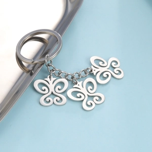 Silver stainless steel keychain with three hollow butterfly pendants and key ring