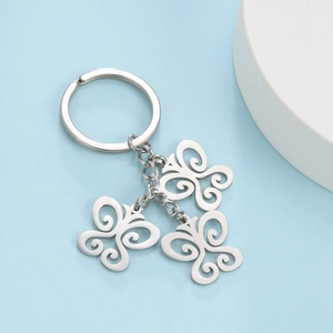 Modern hollow butterfly keychain pendant in silver metal finish with triple charms
