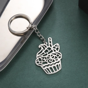 Porte-clés en acier inoxydable avec pendentif cupcake évidé au design filigrane argent