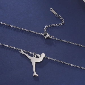 Detailed view of silver stainless steel figure skater pendant with adjustable lobster clasp