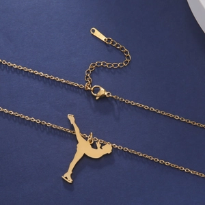 Detail of golden figure skating pendant with adjustable lobster clasp and extension chain