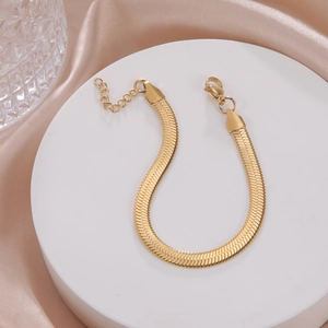 Elegant gold flat snake bone chain bracelet with lobster clasp and adjustable extension link